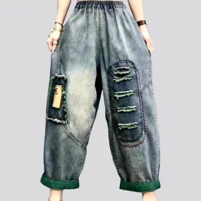 Vintage distressed denim pants for women